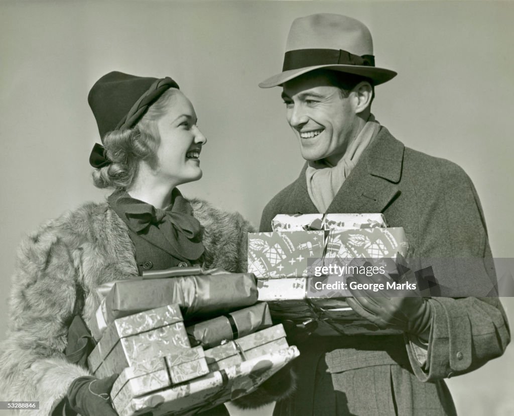 Man and woman with Christmas presents
