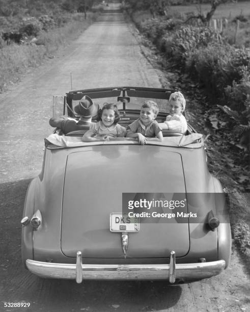 family in car - 1950's cars stock pictures, royalty-free photos & images