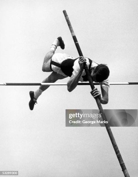 man pole vaulting - vintage track and field stock pictures, royalty-free photos & images