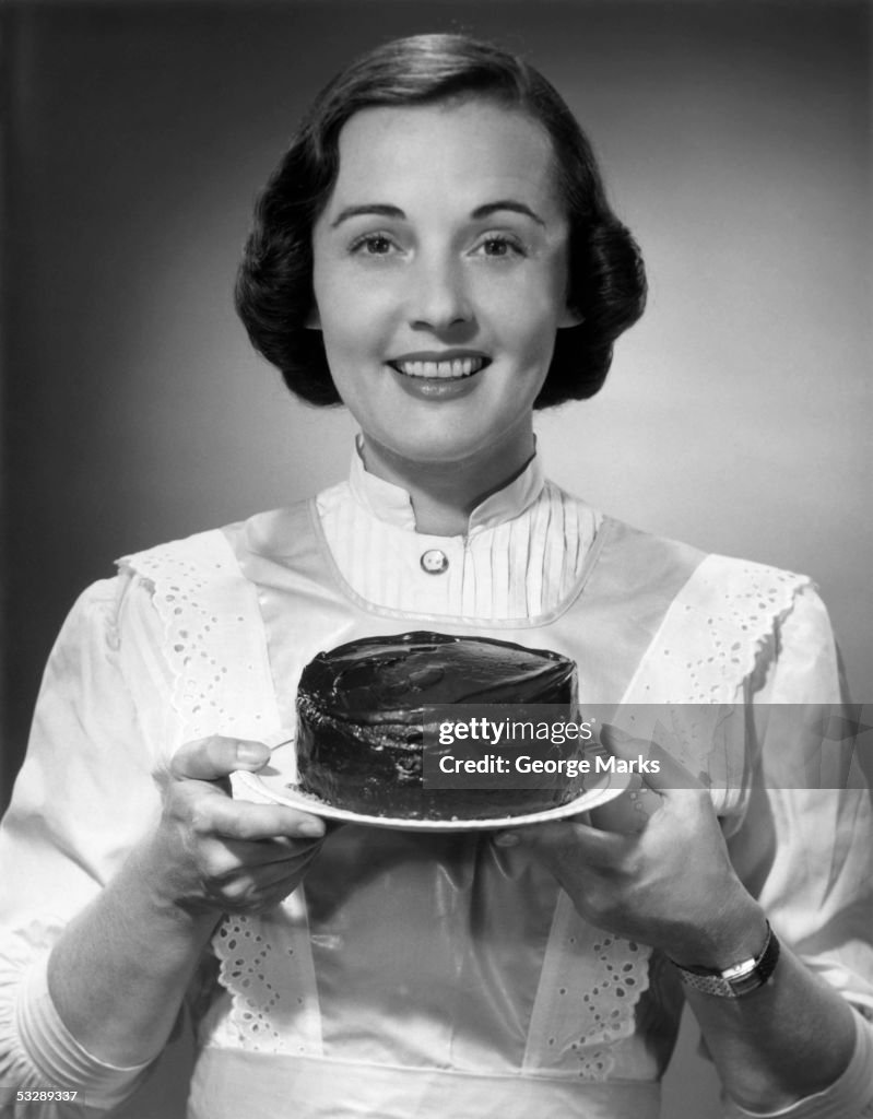 Woman holding cake