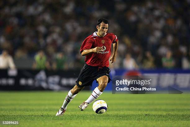 Ryan Giggs of Manchester United in action during a pre-season friendly match between Manchester United and Beijing Hyundai at Workers' Stadium on...