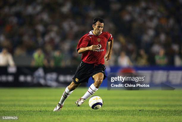 Ryan Giggs of Manchester United in action during a pre-season friendly match between Manchester United and Beijing Hyundai at Workers' Stadium on...