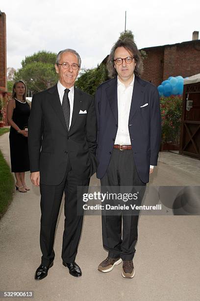 Bruno Ermolli and Gigi Marzullo attend the concert for the 150th anniversary of Giacomo Puccini's birth during the 54th Festival Puccini in Torre del...