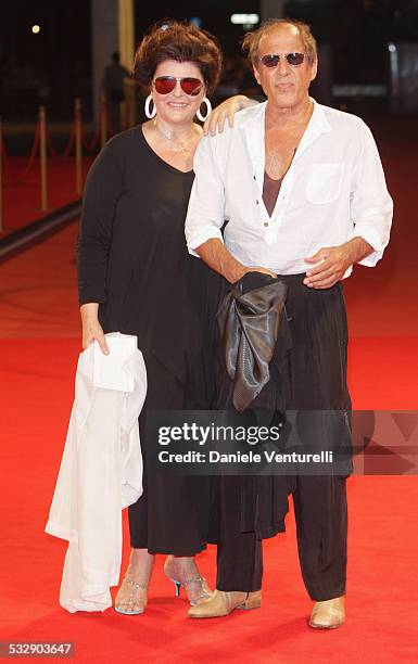 Director Adriano Celentano and Claudia Mori attend the Yuppi Du film premiere at the Sala Grande during the 65th Venice Film Festival on September 4,...