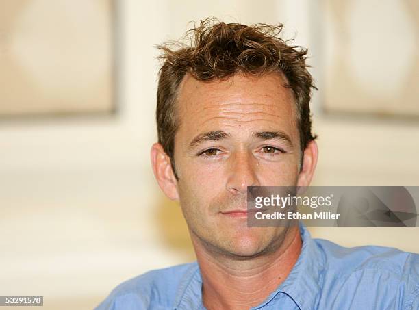 Actor Luke Perry listens during a news conferene at the Video Software Dealers Association's annual home video convention at the Bellagio July 26,...