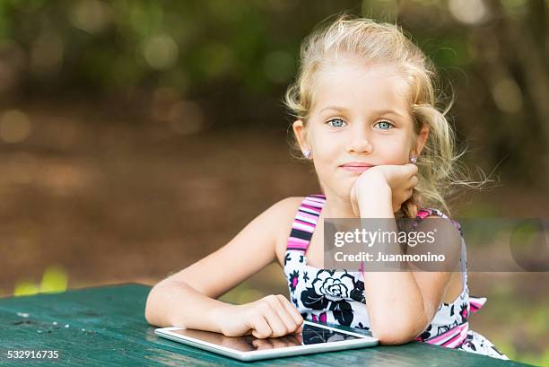 beautiful little girl - smirk stock pictures, royalty-free photos & images