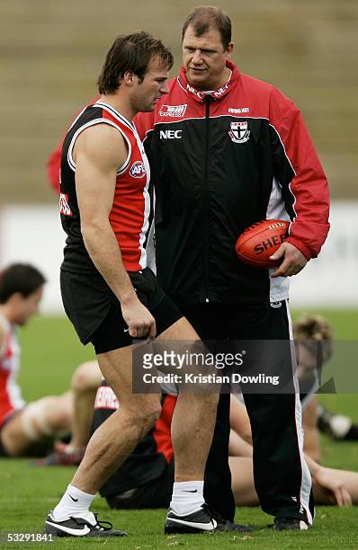 Aaron Hamill is instructed by Saints coach Grant Thomas during the St Kilda Football Club's AFL training session at the Moorabin Oval July 27, 2005...