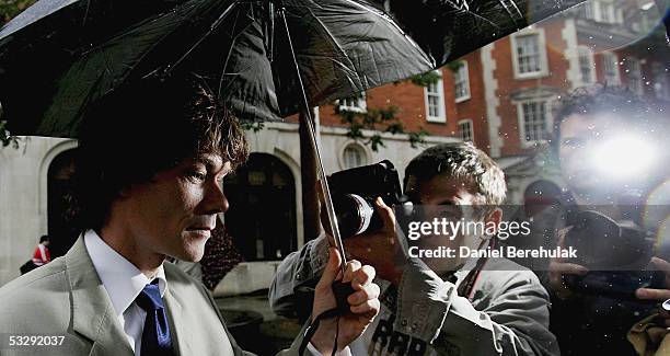 Gary McKinnon of North London enters the Bow Street Magistrates Court on July 27, 2005 in London, England. McKinnon of Wood Green, North London,...