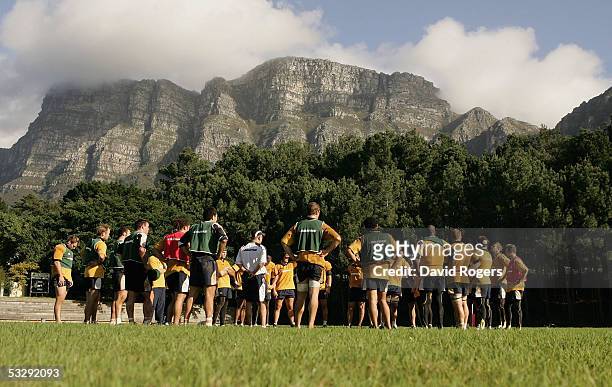 The Australian rugby team gather instructions during the Wallaby training session held at Westerford School on July 27, 2005 in Cape Town, South...