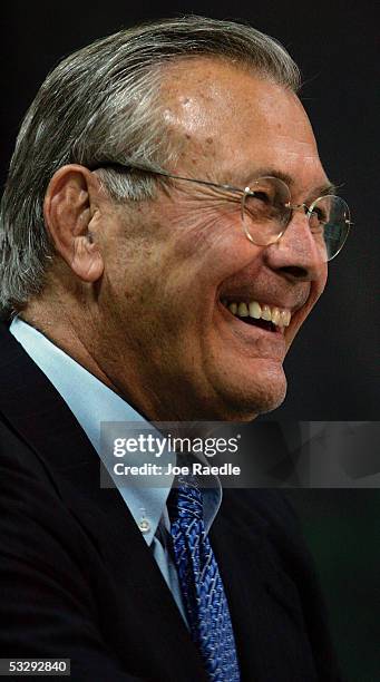 Secretary of Defense Donald Rumsfeld laughs as he answers a question during a town hall-style meeting with U.S. Soldiers July 27, 2005 at the Balad...