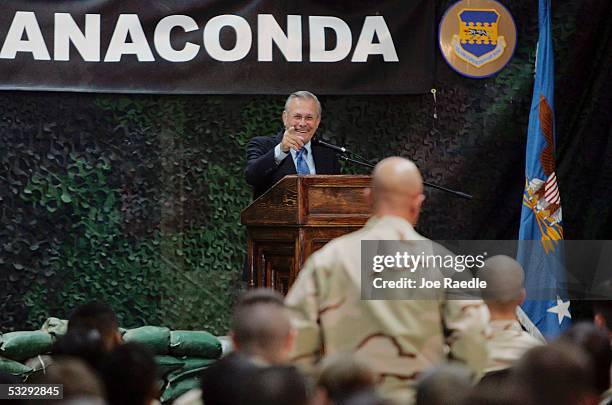 Secretary of Defense Donald Rumsfeld calls on a U.S. Army Soldier to ask a question during a town hall-style meeting July 27, 2005 at the Balad...