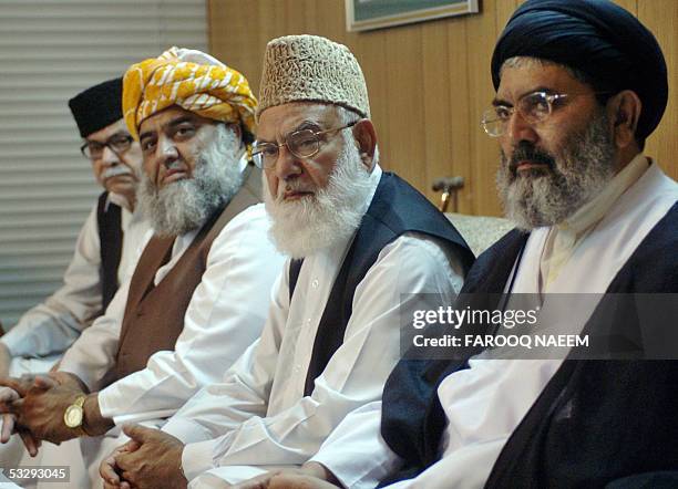 Leaders of Pakistani Islamic alliance the Muttahida Majlis-e-Amal Sajid Naqvi and Qazi Hussain Ahmed and Maulana Fazal-ur- Rehman attend a meeting to...