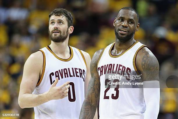 Kevin Love of the Cleveland Cavaliers and LeBron James react during the second half against the Toronto Raptors in game two of the Eastern Conference...