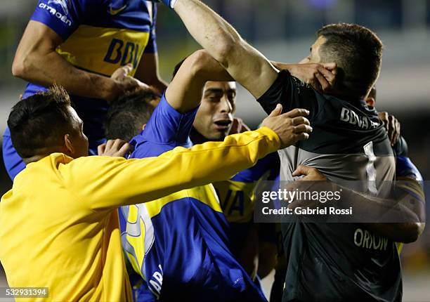 Agustin Orion goalkeeper of Boca Juniors celebrates with his teammates after winning a second leg match between Boca Juniors and Nacional as part of...