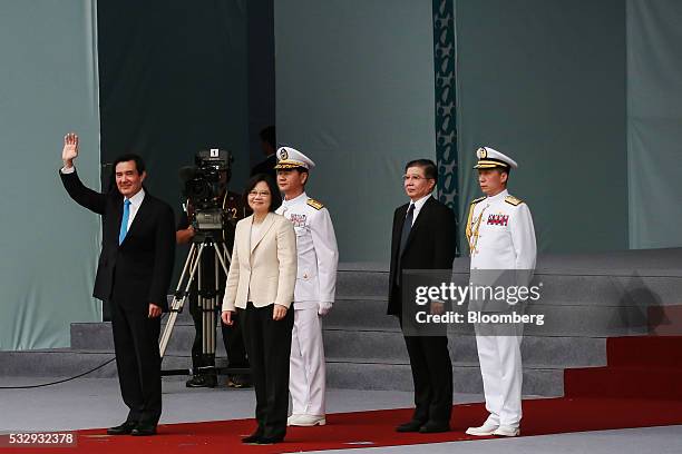 Ma Ying-jeou, Taiwan's outgoing president, left, waves as Tsai Ing-wen, Taiwan's incoming president, second left, looks on during Tsai's inauguration...