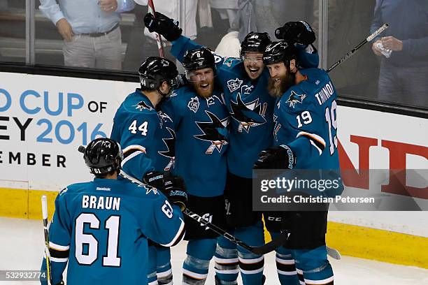 Tomas Hertl of the San Jose Sharks celebrates with Justin Braun, Marc-Edouard Vlasic, Joe Pavelski and Joe Thornton after his second goal in game...