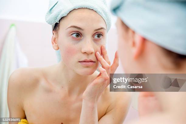 young woman in bathroom - beautiful woman and tired stock pictures, royalty-free photos & images