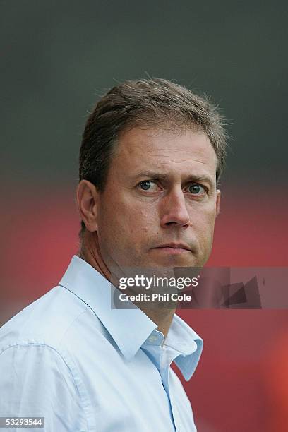 Alan Perrin, manager of Portsmouth, looks on during a pre-season friendly match between Bournemouth and Portsmouth at the Fitness First Stadium on...