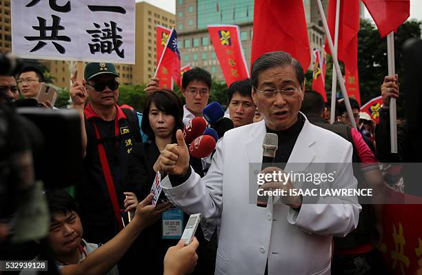 Chang An-lo , also known as "White Wolf", leader of the China Unification Promotion Party, speaks to the media at the Inauguration ceremony of new...