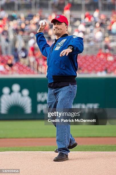 Astronaut Dr. Kjell Lindgren throws out the ceremonial first pitch before a MLB baseball game between the Washington Nationals and the Philadelphia...