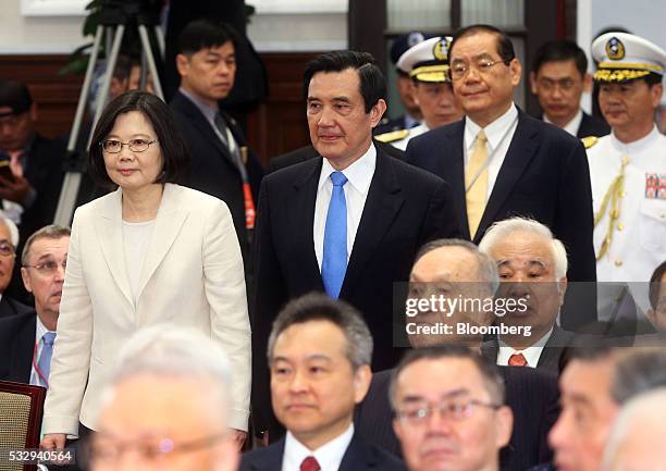 Tsai Ing-wen, Taiwan's incoming president, left, and Ma Ying-jeou, Taiwan's outgoing president, second left, arrives at an inauguration ceremony at...