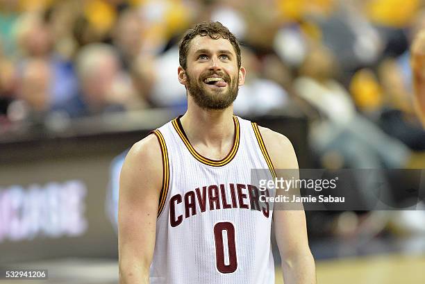 Kevin Love of the Cleveland Cavaliers reacts during the second half against the Toronto Raptors in game two of the Eastern Conference Finals during...