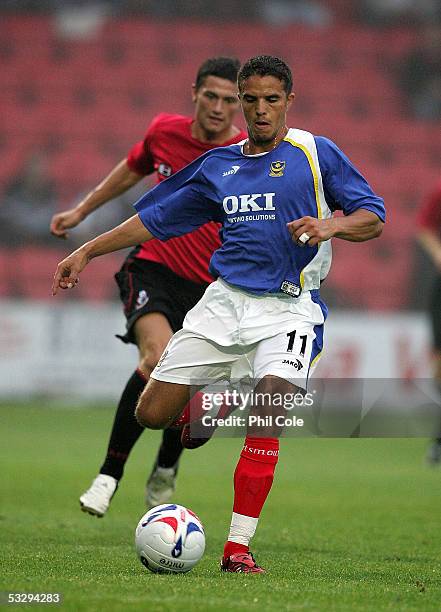 Laurent Robert of Portsmouth moves the ball during a pre-season friendly match between Bournemouth and Portsmouth at the Fitness First Stadium on...