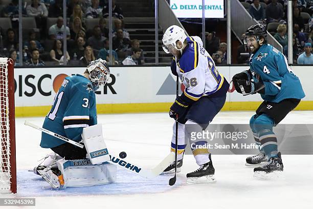 Martin Jones of the San Jose Sharks makes a save on a shot by Kyle Brodziak of the St. Louis Blues in game three of the Western Conference Finals...