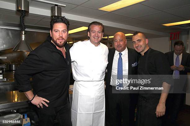 Scott Conant, Michael White, Andrew Zimmern and Marc Forgione pose at the Celebrity Chef Andrew Zimmern Hosts "Dinner For A Better New York"...