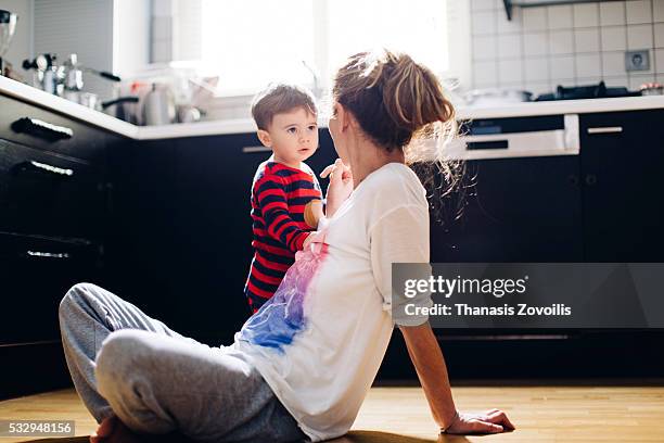 mother berating her little kid son - furious child stock pictures, royalty-free photos & images