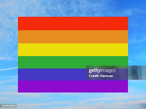 rainbow flag - pride flag waving stock illustrations