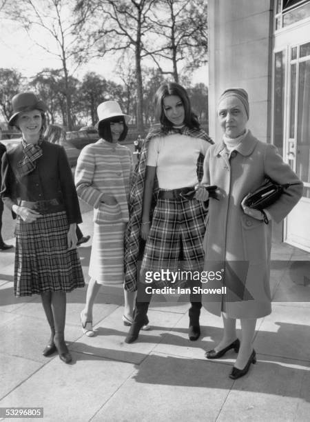 Paris couturier Madame Gres , with models Gyll, Devi and Betty outside the Dorchester Hotel, 22nd March 1971. Madame Gres, who opened her fashion...