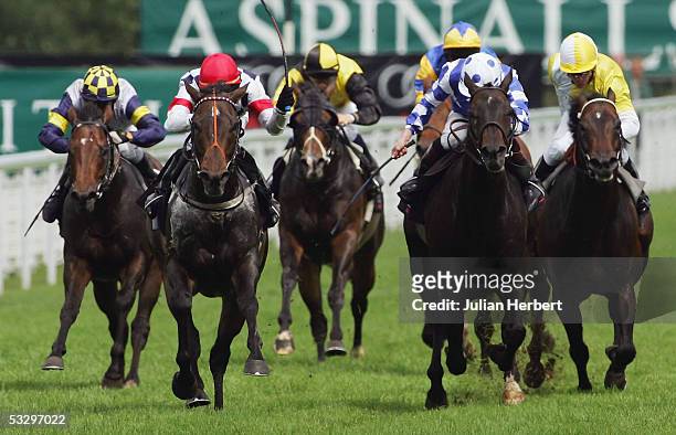 Adrian Nicholls and Fire Up The Band land The Audi Stakes Race run at Goodwood Racecourse on July 28, 2005 in Goodwood, England.