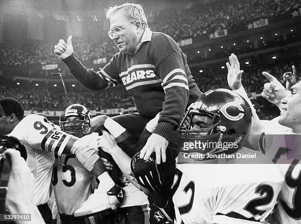 Defensive coordinator Buddy Ryan of the Chicago Bears is carried off the field following Super Bowl XX against the New England Patriots at the...