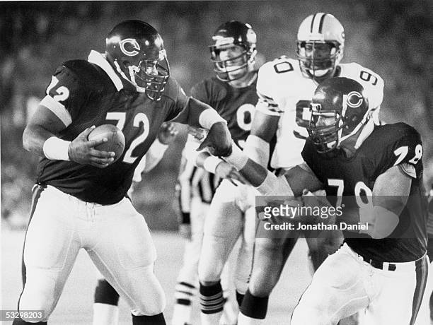 William Perry of the Chicago Bears celebrates a touchdown with Keith Van Horne during the game against the Green Bay Packers at Soldier Field on...