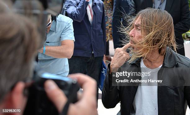 Iggy Pop gestures as he attends the 'Gimme Danger' Photocall at the annual 69th Cannes Film Festival at Palais des Festivals on May 19, 2016 in...