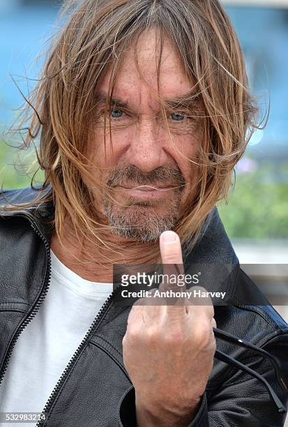 Iggy Pop gestures as he attends the 'Gimme Danger' Photocall at the annual 69th Cannes Film Festival at Palais des Festivals on May 19, 2016 in...