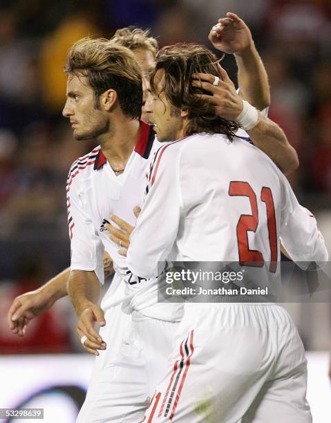 Alberto Gilardino of AC Milan celebrates with teammates during a friendly match against the Chicago Fire on July 27, 2005 at Soldier Field in...