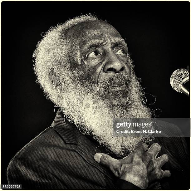 Comedian/civil rights activist Dick Gregory speaks on stage following the opening night performance of "Turn Me Loose" held at The Westside Theatre...