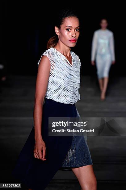 Model walks the runway in a design by Marika Deku at the Pacific Resort show at Mercedes-Benz Fashion Week Resort 17 Collections at Carriageworks on...