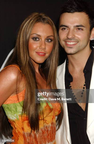 Michelle Heaton and Andy Scott Lee arrive at the UK Premiere of "Herbie: Fully Loaded" at Vue West End on July 28, 2005 in London, England.