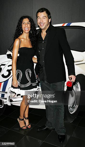 Singer Steve Brookstein and his guest arrive at the UK Premiere of "Herbie: Fully Loaded" at Vue West End on July 28, 2005 in London, England.