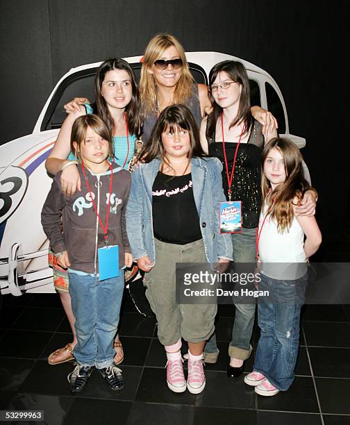Actress Michelle Collins and her family and friends arrive at the UK Premiere of "Herbie: Fully Loaded" at Vue West End on July 28, 2005 in London,...