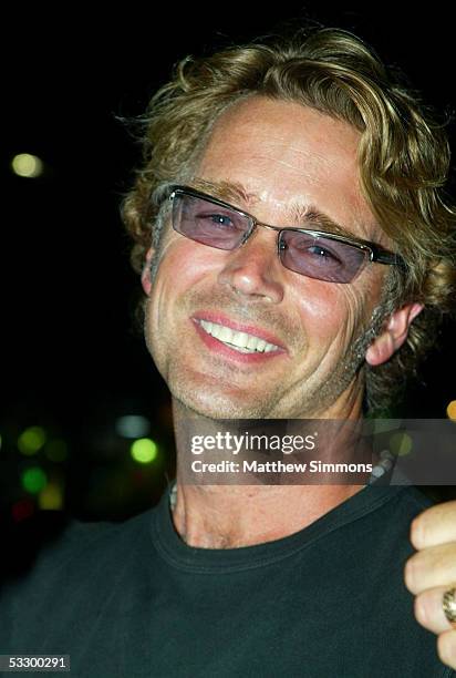 Actor John Schneider arrives at the Premiere Of "The Dukes of Hazzard" at the Grauman's Chinese Theatre on July 28, 2005 in Hollywood, California.