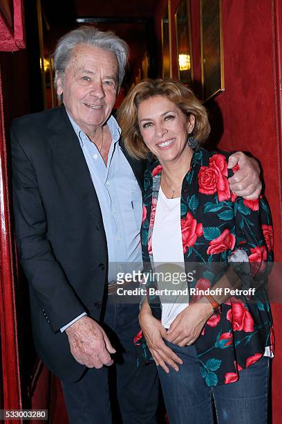 Actors Alain Delon and Corinne Touzet attend the 100th representation of the Theater piece "Un nouveau depart" at Theatre Des Varietes on May 19,...