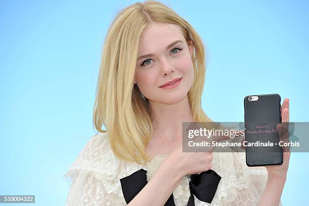 Actress Elle Fanning attends "The Neon Demon" Photocall during the 69th annual Cannes Film Festival at the Palais des Festivals on May 20, 2016 in...