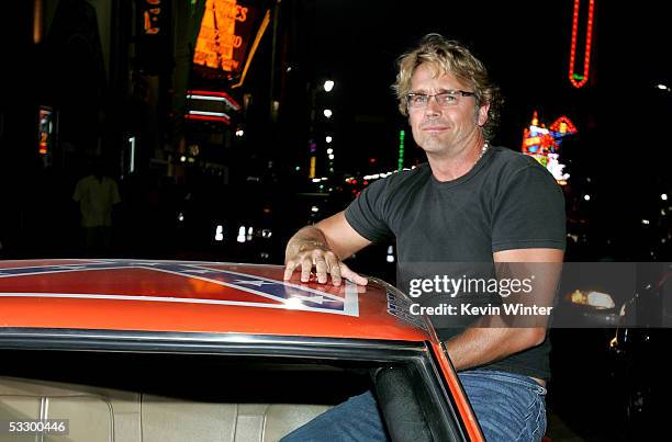 Actor John Schneider arrives at the Premiere Of "The Dukes of Hazzard" at the Grauman's Chinese Theatre on July 28, 2005 in Hollywood, California.