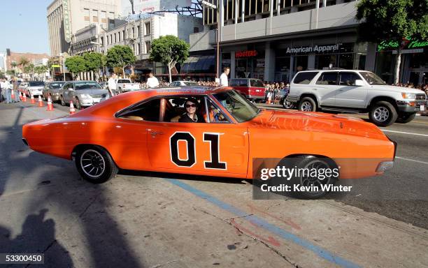 The "General Lee", a 1969 Dodge Charger muscle car arrives at the Premiere Of "The Dukes of Hazzard" at the Grauman's Chinese Theatre on July 28,...