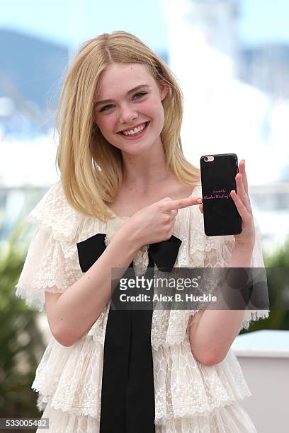 Actress Elle Fanning attends "The Neon Demon" Photocall during the 69th annual Cannes Film Festival at the Palais des Festivals on May 20, 2016 in...