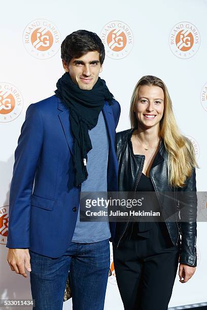 Pierre Hugues Herbert of France and his girlfriend attend the Roland Garros Players' Party at Grand Palais on May 19, 2016 in Paris, France.